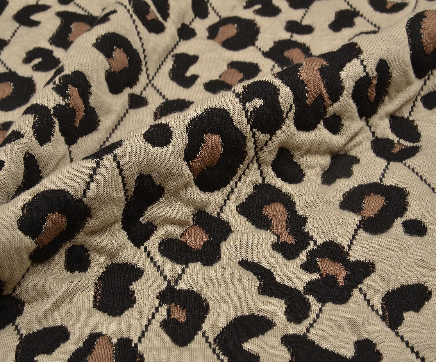LEOPAR DESENLİ ÖRME KAPİTONE KUMAŞ - BEJ